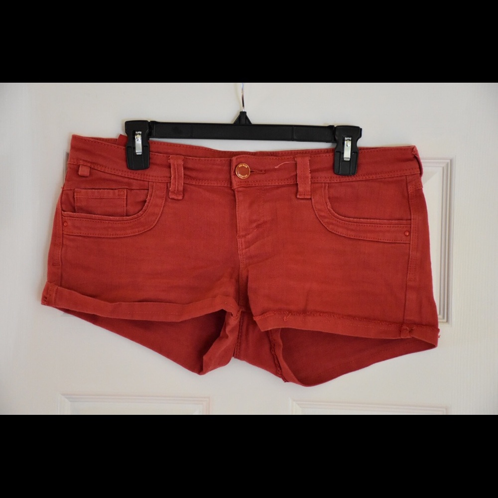 A pair of red shorts
